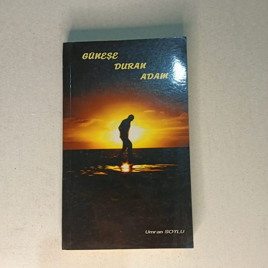 GÜNEŞE DURAN ADAM (ŞİİR - İMZALI))
